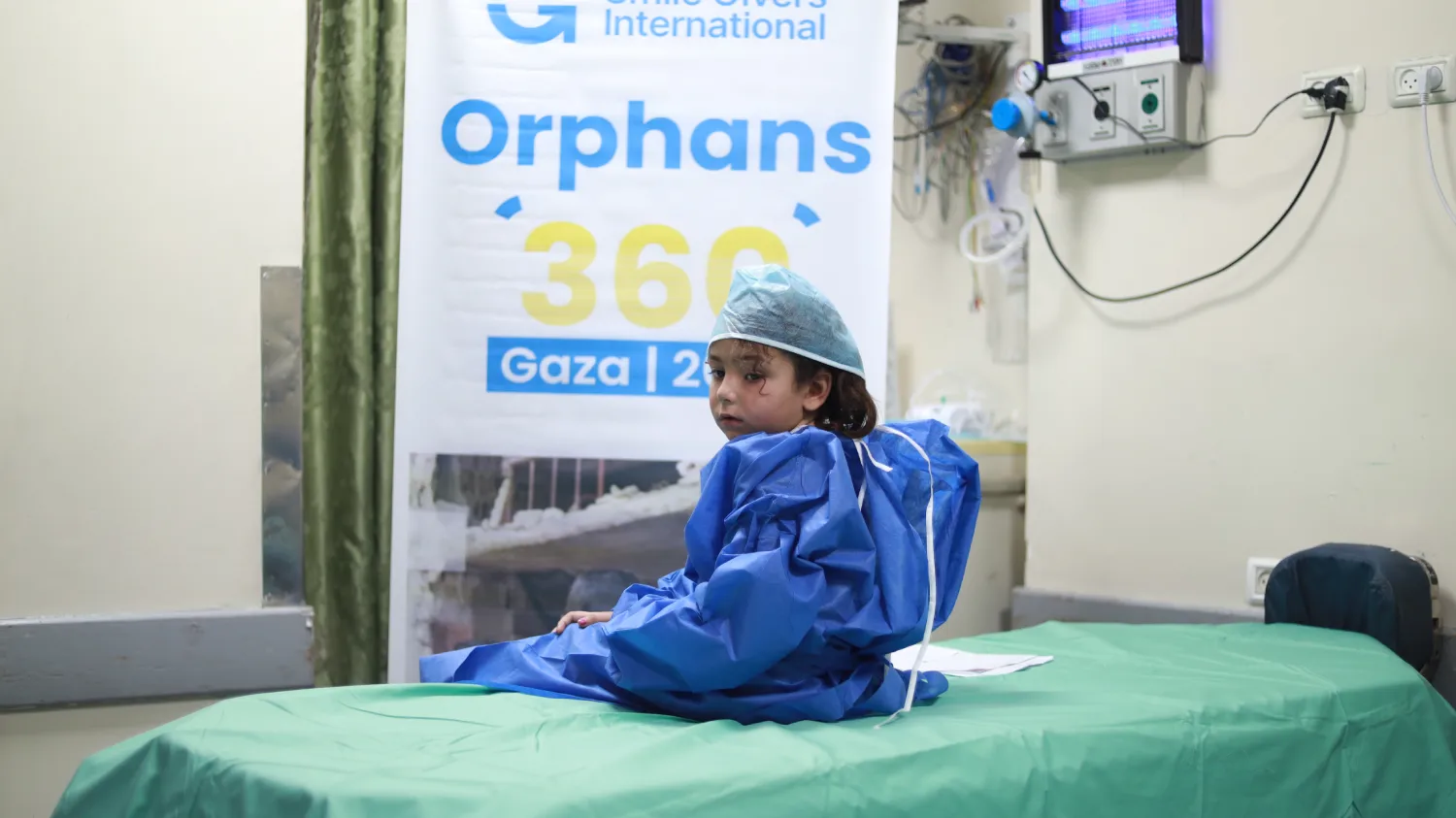 Orphan child receiving medical care in Gaza